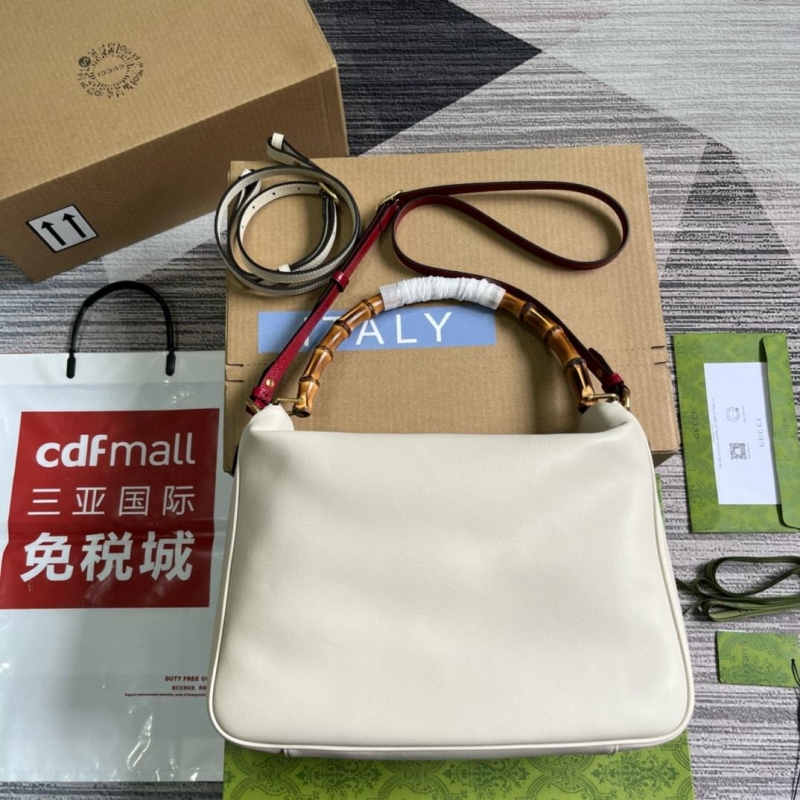 G*u*i top handle bags
